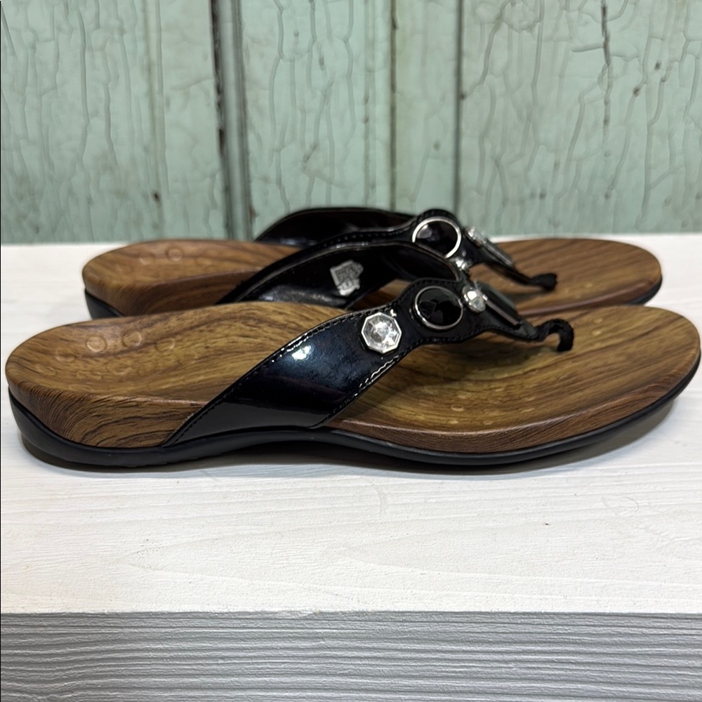 Vionic Black and Brown Sandals with Metallic Accents - Picture 3 of 7